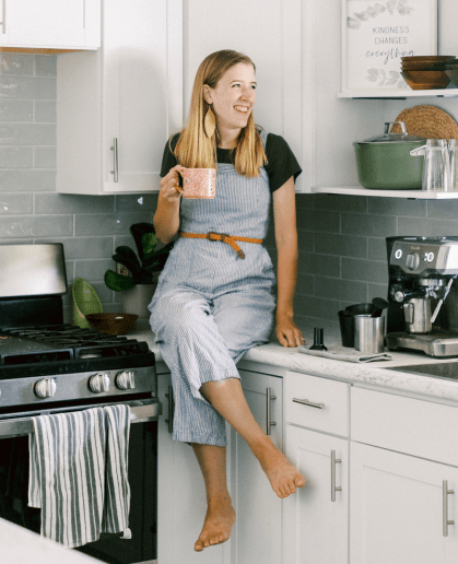 Tasha relaxing in a clean kitchen