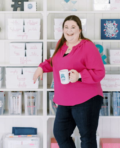 Laura relaxing in her organized office