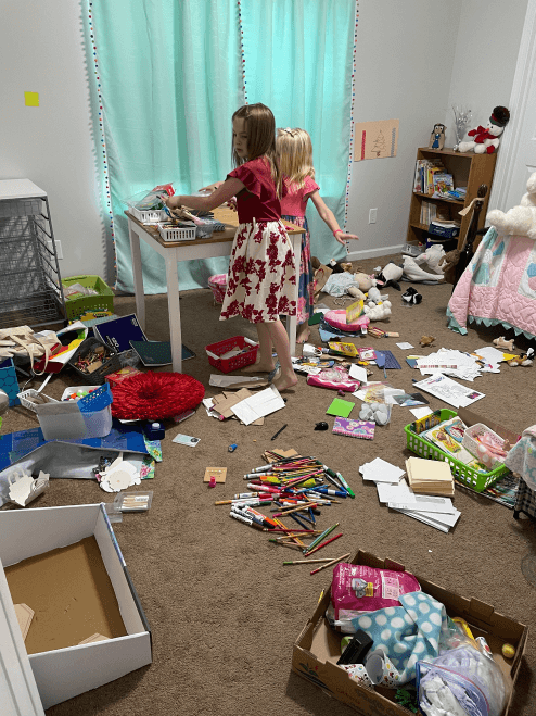 Kids decluttering the room