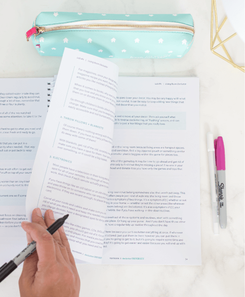 Someone flipping through the textbook